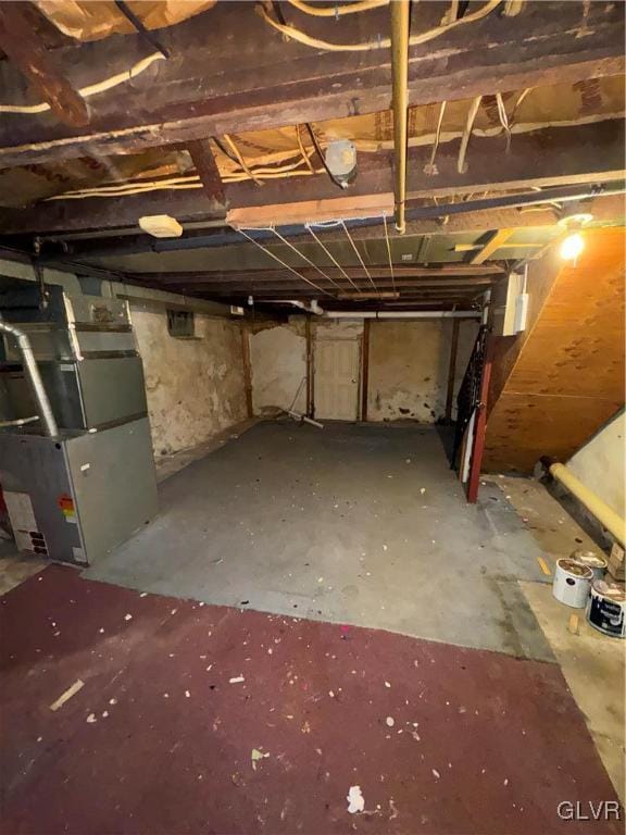 basement featuring heating unit