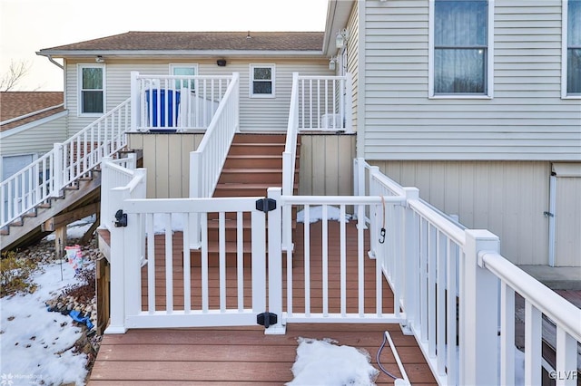 view of snow covered deck