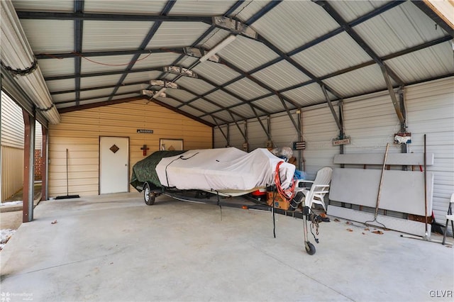 garage featuring a carport