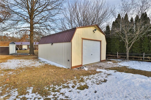 view of snow covered garage