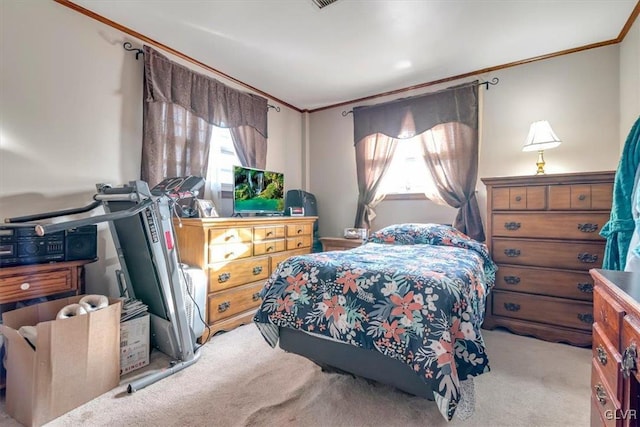 carpeted bedroom featuring crown molding