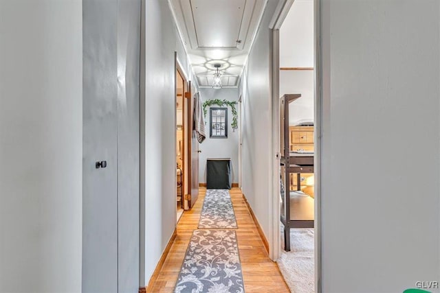 corridor featuring light wood-type flooring