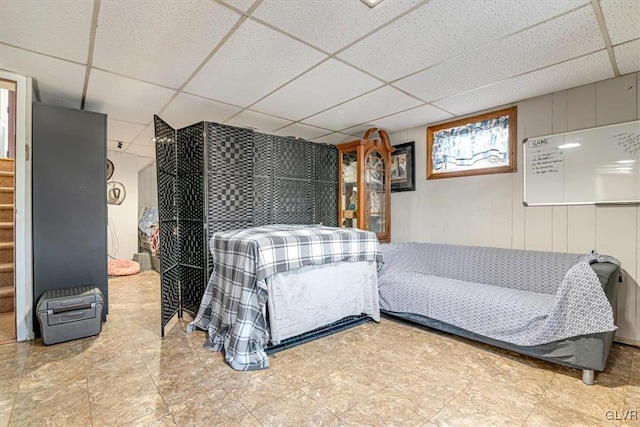 bedroom with a paneled ceiling