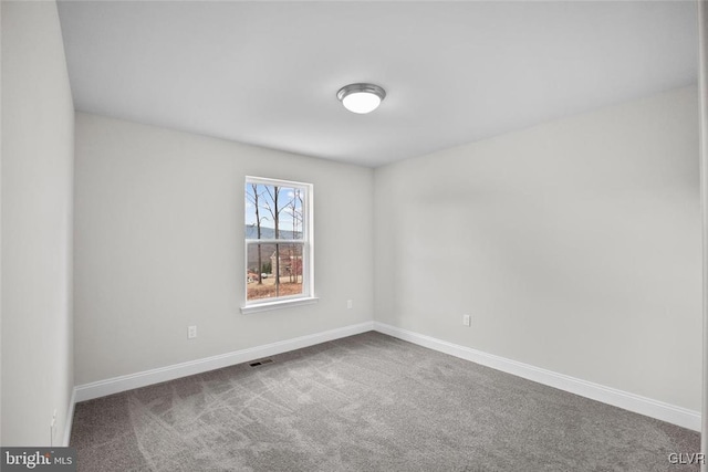 view of carpeted spare room