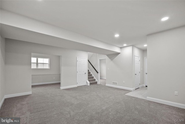 basement with light carpet