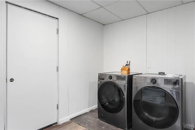 washroom featuring washing machine and dryer