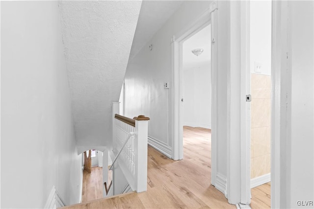 hallway with light wood-type flooring