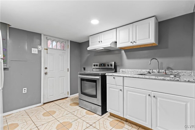 kitchen featuring white cabinetry, stainless steel electric range oven, and sink