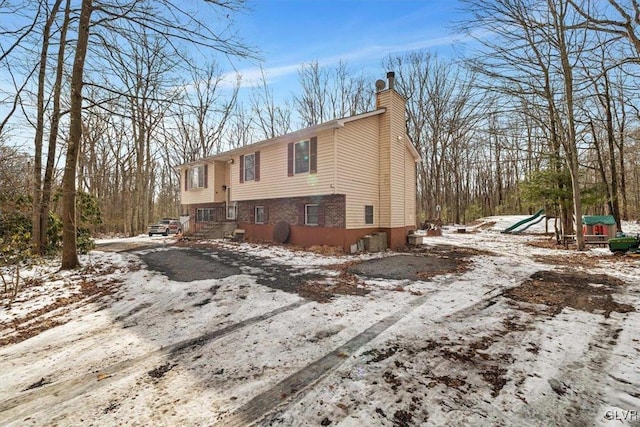 view of snow covered property