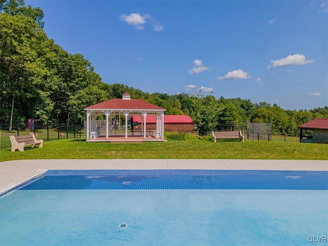 view of pool featuring a gazebo and a lawn