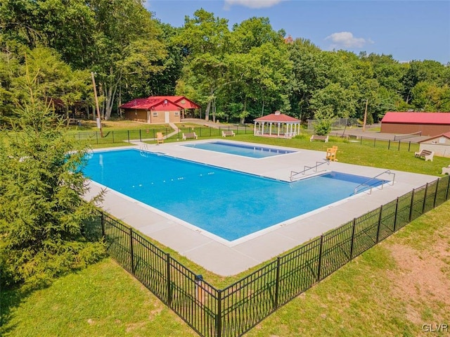 view of swimming pool with a gazebo, a patio area, and a lawn