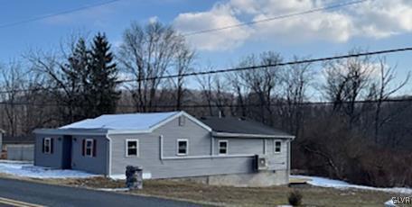 view of snow covered property