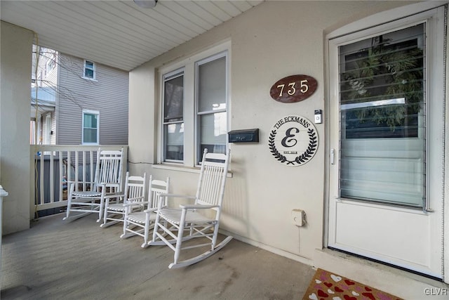 entrance to property with a porch