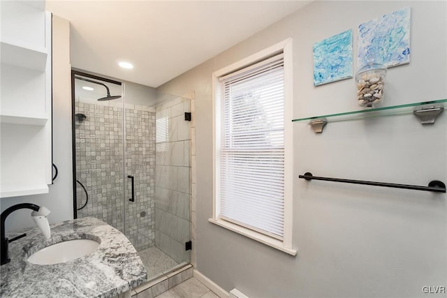 bathroom featuring vanity and walk in shower