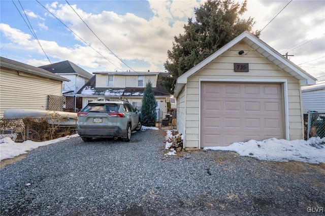 view of snow covered garage