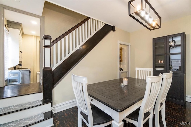 dining room featuring dark hardwood / wood-style floors