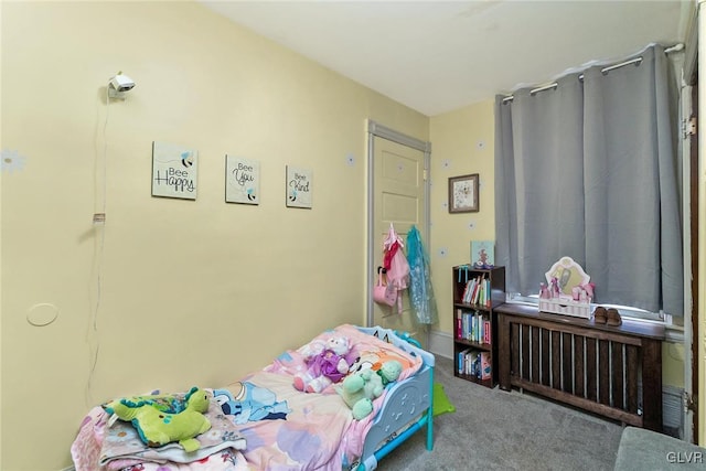 bedroom featuring carpet