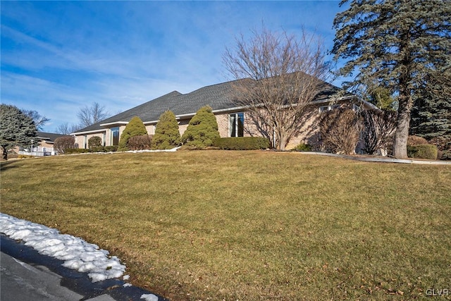 view of front of home with a front yard