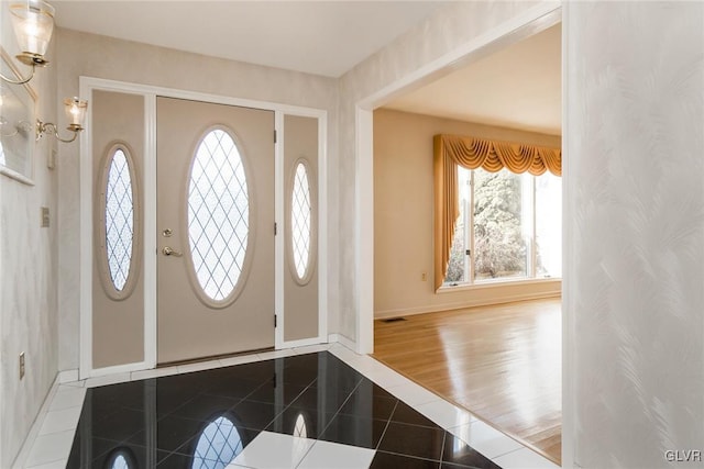 entrance foyer featuring tile patterned flooring