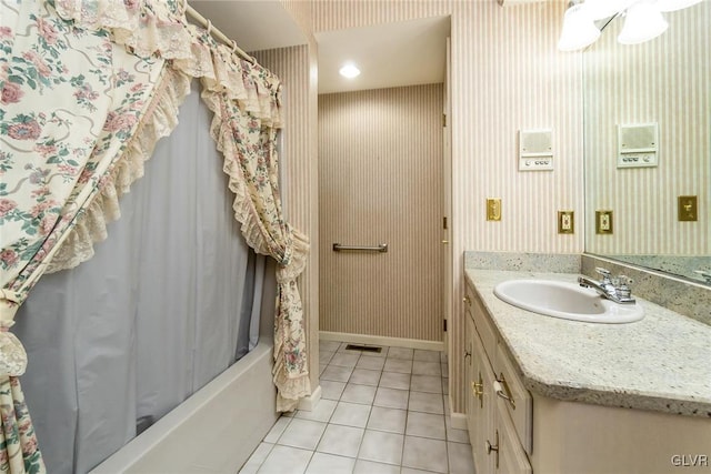 bathroom with vanity, shower / tub combo, and tile patterned floors