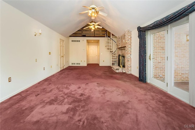 unfurnished living room featuring lofted ceiling, dark carpet, and ceiling fan