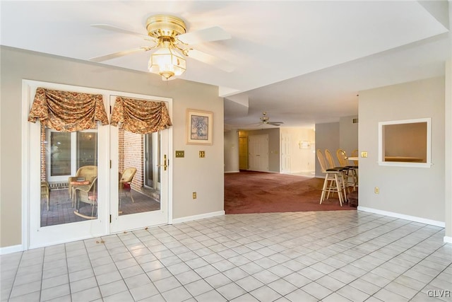 carpeted empty room with ceiling fan