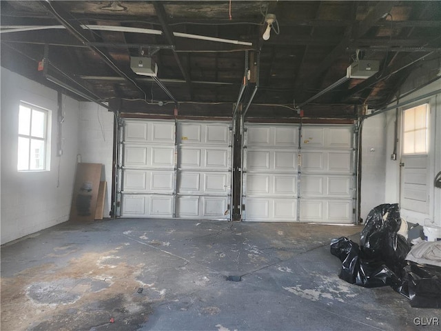 garage featuring a garage door opener