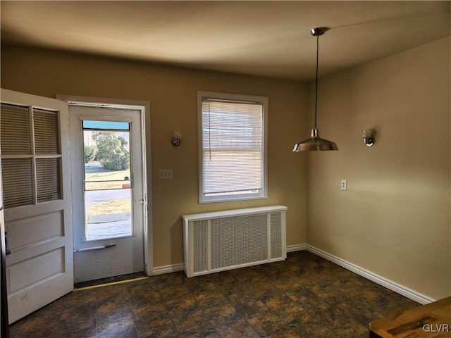 doorway to outside featuring radiator