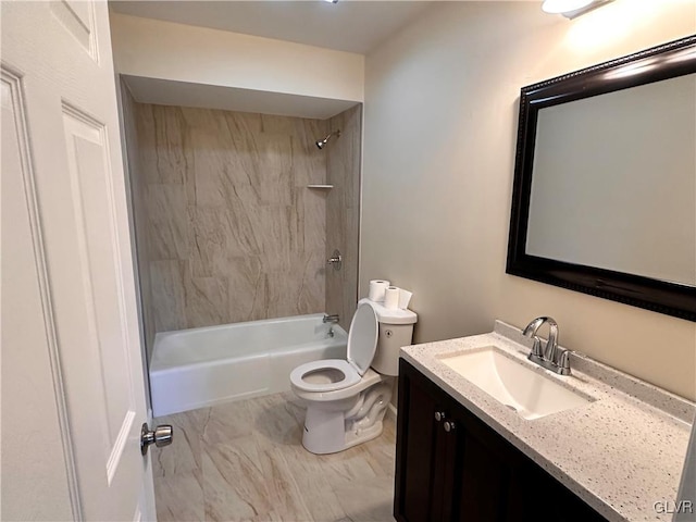 full bathroom featuring vanity, tiled shower / bath combo, and toilet