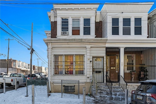 view of front of house with cooling unit