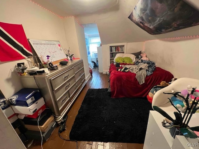 bedroom featuring dark hardwood / wood-style floors