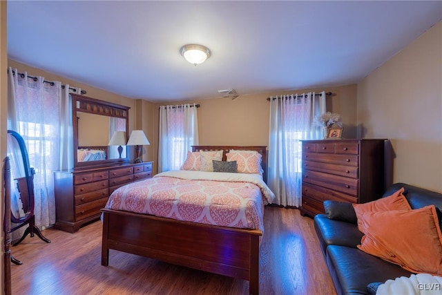 bedroom featuring hardwood / wood-style flooring