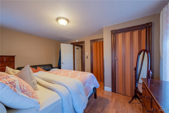 bedroom featuring hardwood / wood-style flooring