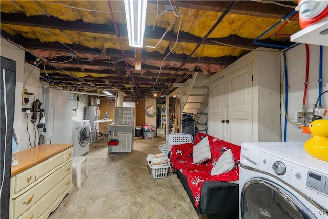 basement with washing machine and dryer and gas water heater