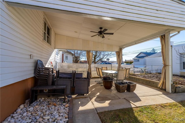 view of patio with ceiling fan