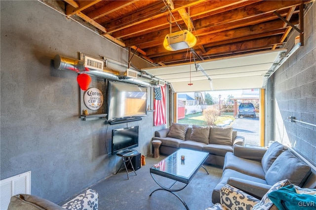 garage featuring a garage door opener