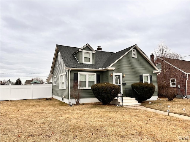 view of front of home with a front yard