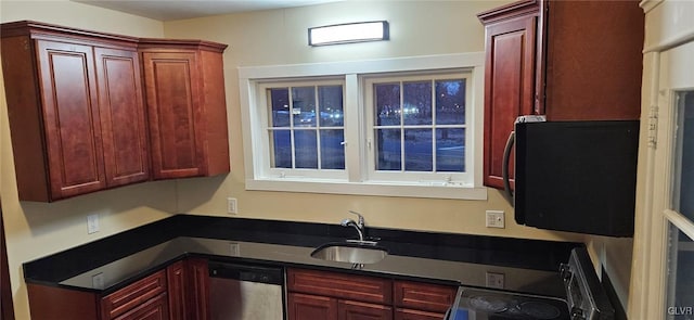 kitchen with stove, sink, and stainless steel dishwasher