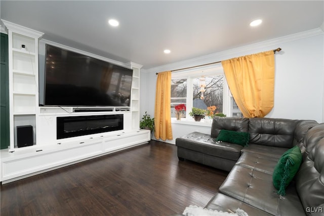 living room featuring dark hardwood / wood-style flooring and crown molding