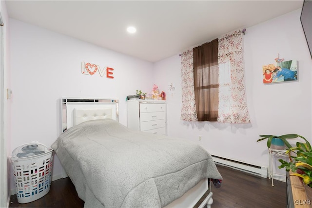 bedroom featuring dark hardwood / wood-style flooring and baseboard heating