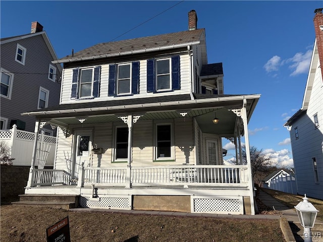 view of front of property featuring covered porch