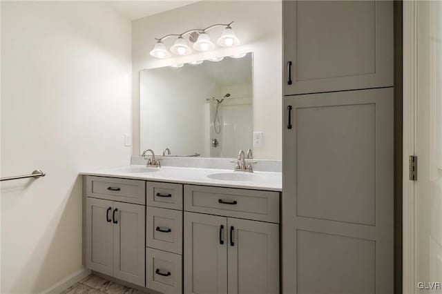 bathroom featuring vanity and a shower