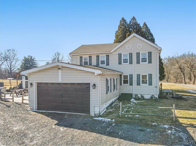 view of front of home with a garage