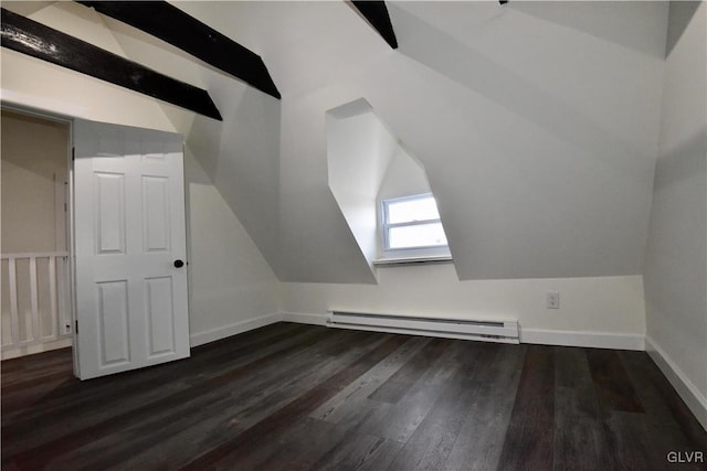 additional living space with lofted ceiling, dark hardwood / wood-style floors, and baseboard heating