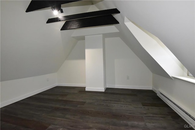 bonus room featuring lofted ceiling, dark hardwood / wood-style flooring, and a baseboard heating unit