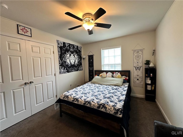 carpeted bedroom with a closet and ceiling fan