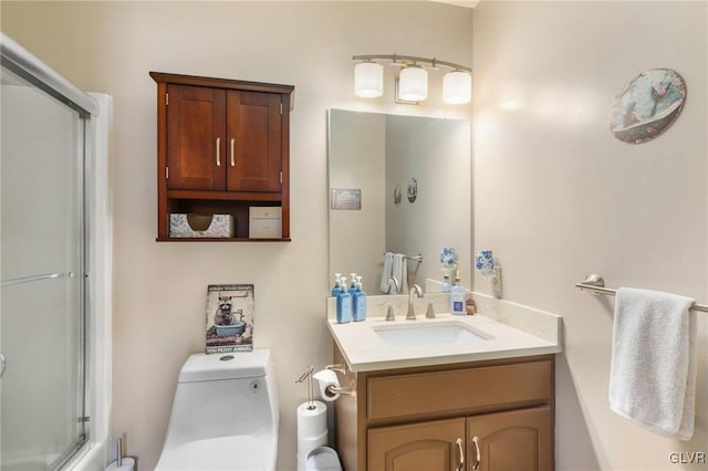 bathroom with vanity and toilet