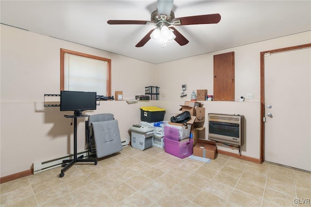 interior space featuring a baseboard heating unit, heating unit, and ceiling fan