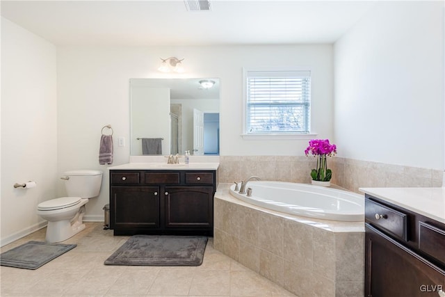 full bathroom with vanity, shower with separate bathtub, tile patterned floors, and toilet