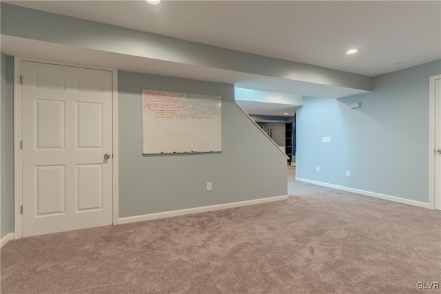 basement with light carpet